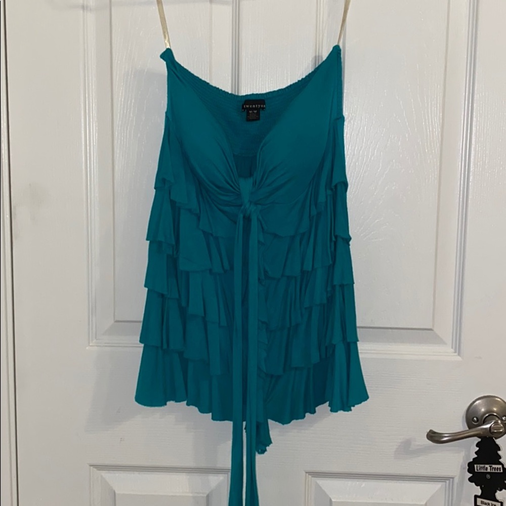 A ruffle greenish shirt